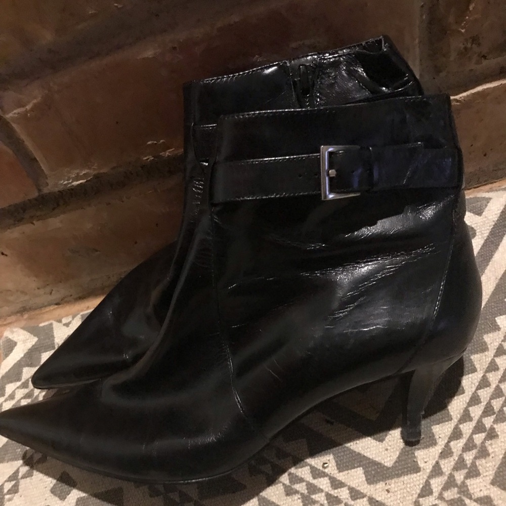 Black booties with fun buckle accessory!